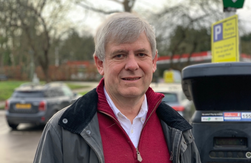 Cllr David Lewis at the Steels Lane car park in Oxshott - where half hour parking has been withdrawn