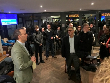 Dominic addresses supporters, while his agent Peter Szanto looks on